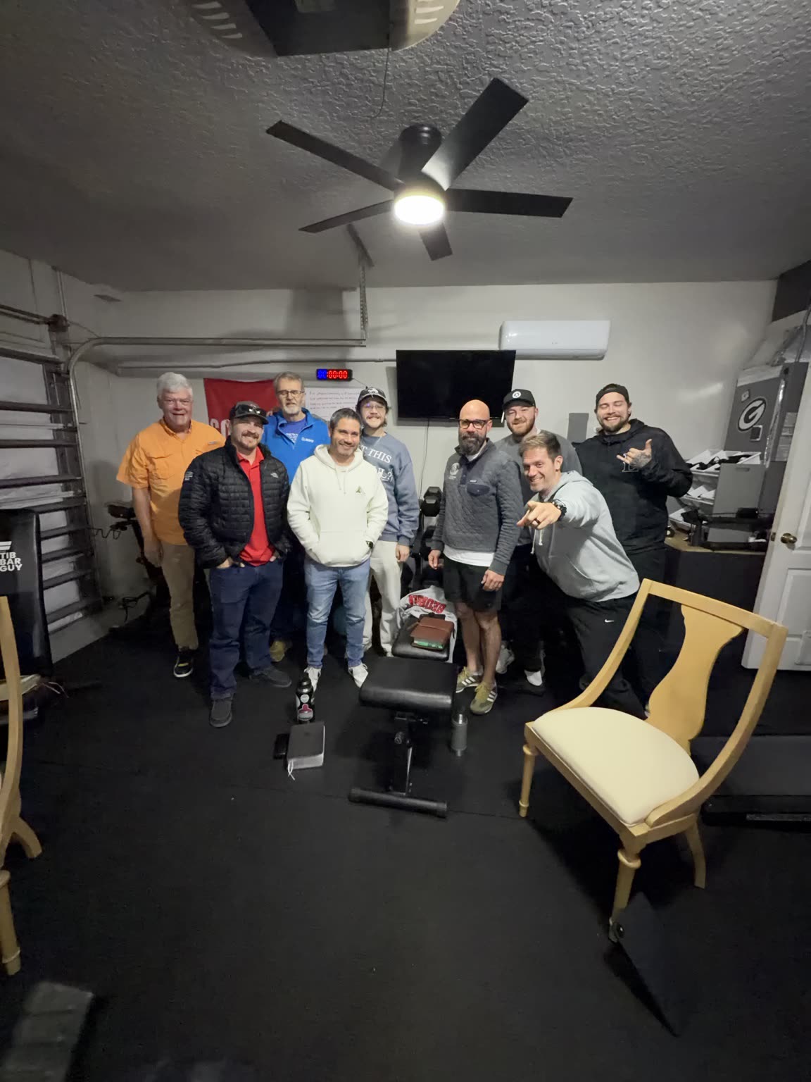 Nick gathered with a group of men