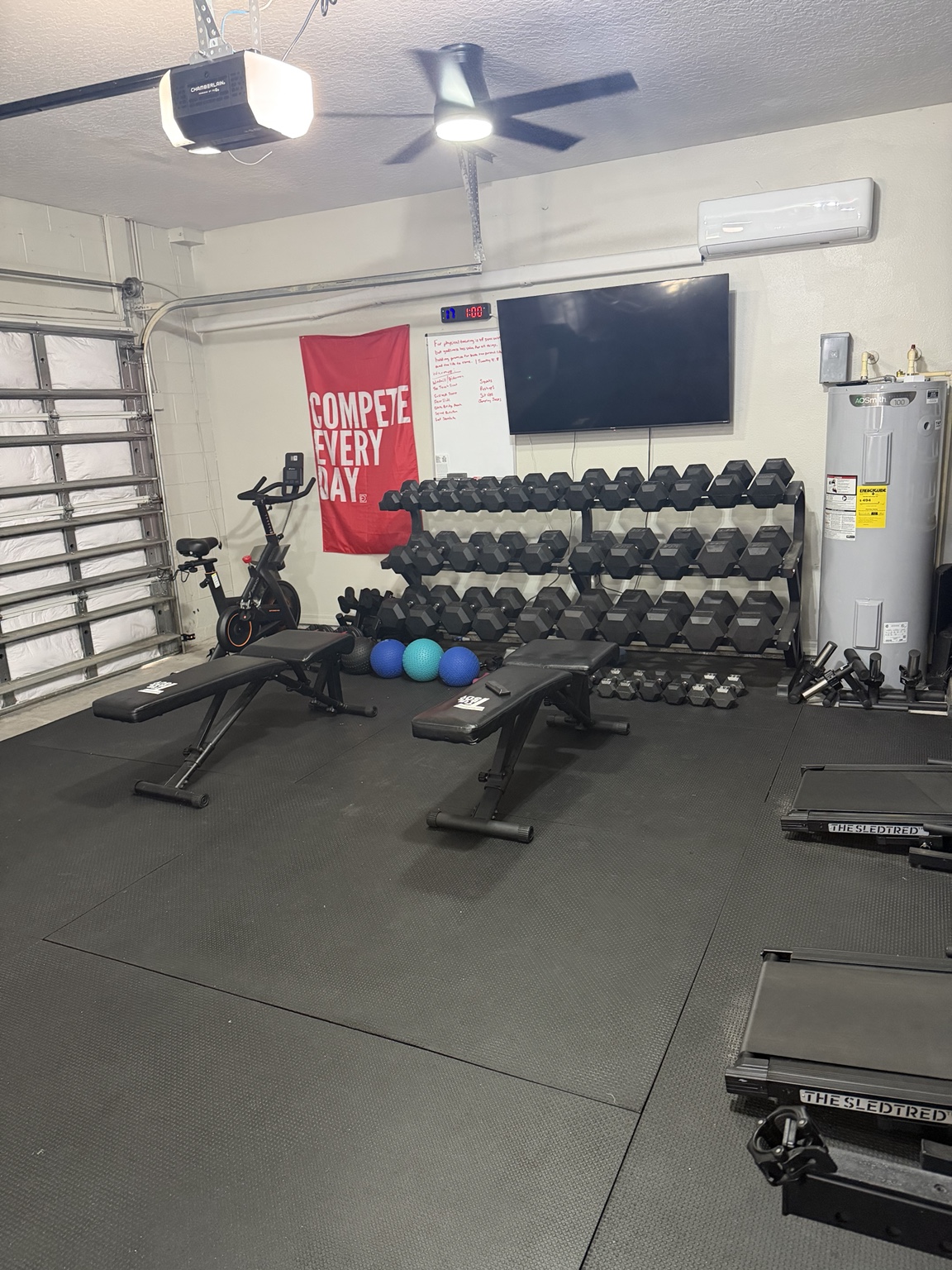 Private personal training gym in DeLand with dumbbells, benches, conditioning equipment, and open training space